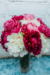 Bouquet of white pink peonies