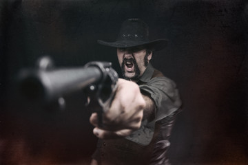 An angry cowboy aiming a revolver pistol and yelling.