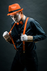 A MIME artist performs on stage. Actor of pantomime theatre. The actor of drama theatre and MIME....