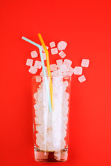 Glass full of sugar cubes - unhealthy diet concept