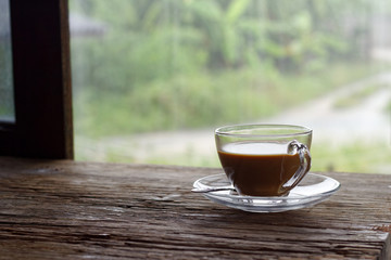 Cup of coffee on a rainy day