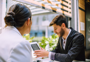 Portrait of creative business people teamwork meeting at cafe