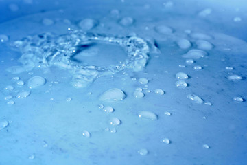 Water drops photographed with higspeed flashes and dropper in the studio