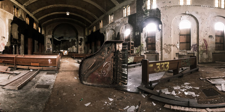 Main aisle view of the former St. Margaret Mary Catholic Church, a dilapidated and vandalized church in Detroit