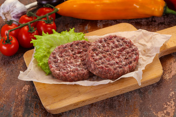 Raw burger cutlet