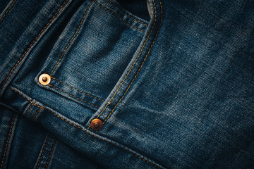 Blue Denim Jeans Pocket Design Details with Rivets and Seams Close Up View