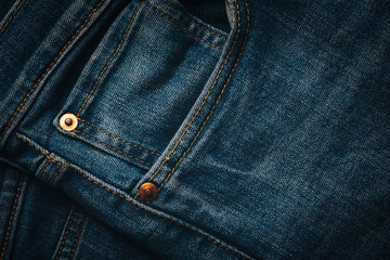 Fototapeta premium Blue Denim Jeans Pocket Design Details with Rivets and Seams Close Up View