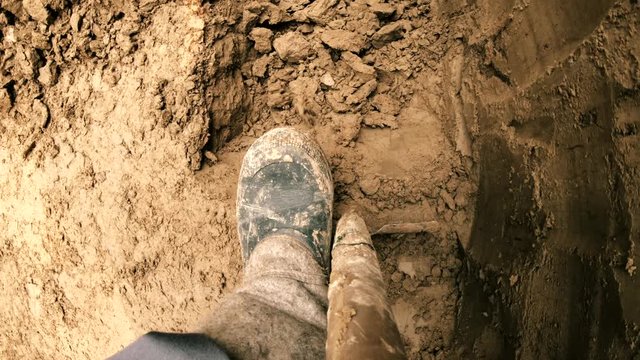 Archaeologist Works on Shovel Camera Shot