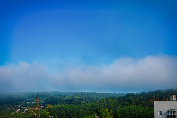 the dispersing mist lifted on the morning in August