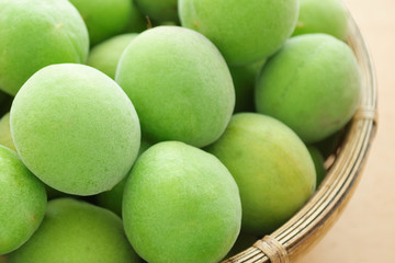 Japanese apricot(ume) fruits in bamboo basket