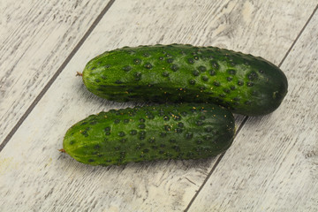 Ripe fresh green two cucumbers