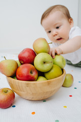 image of a cute baby boy with apple