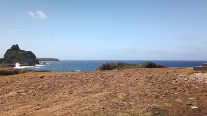 Sao Pedro dos Pescadores, Saint Pedro of Fishermen Chapel at Fernando de Noronha Island, Pernambuco, Brazil - July, 2019 - Beautiful 4k footage in a blue sky day