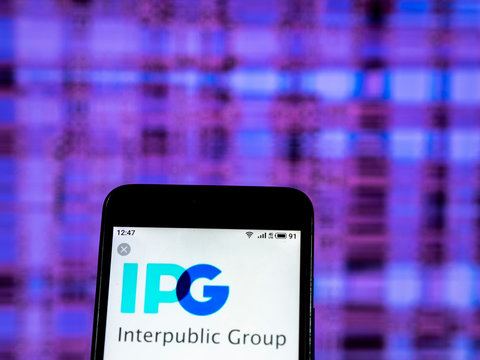 Kiev, Ukraine, December 28, 2018, illustrative editorial. Interpublic Group of Companies Advertising company logo seen displayed on smart phone