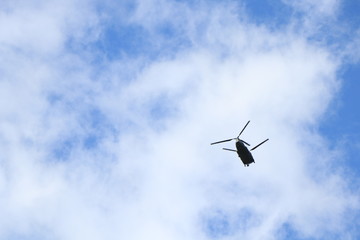 helicopter in blue sky