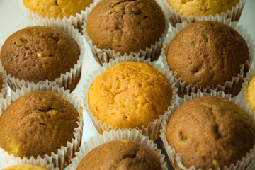 Close up of homemade cupcakes in paper cups