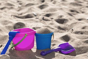 Fototapeta na wymiar Bucket and Shovel on a Beach