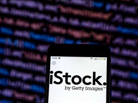 Kiev, Ukraine, December 7, 2018, illustrative editorial. iStock is an online royalty free, international micro stock photography provider  logo seen displayed on smart phone.