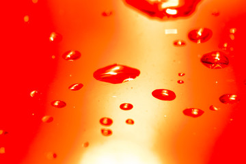 Texture of water droplets in red. Makro, close-up.