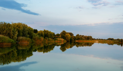 lake and blue sky and forest. beautiful landscape