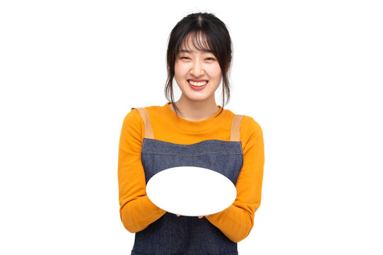 Young Asian Woman Cook Or Baker Holding Empty White Plate Or Dish Isolated On White Background, Chef Bakery Female Concept