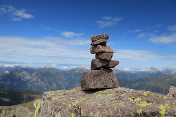 pile of stones on top of a mountain