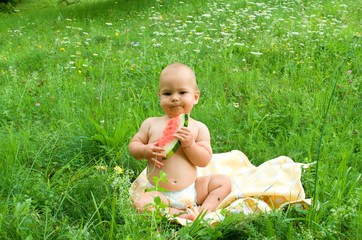 baby eats watermelon, baby outdoors, first lure
