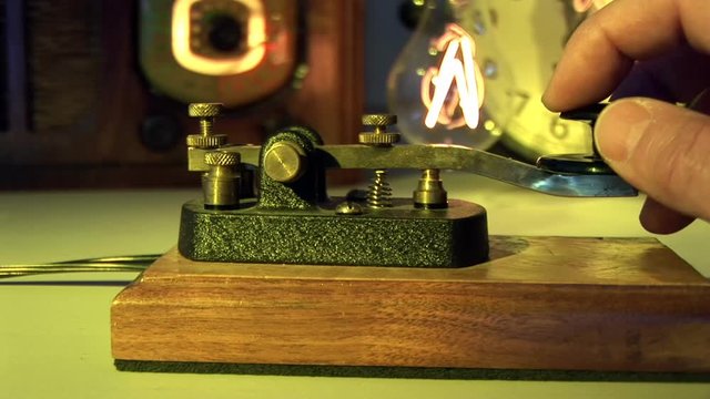 Radio operator makes an attempt to send the ships position. Lit with yellow gel and vintage props to portray the time.