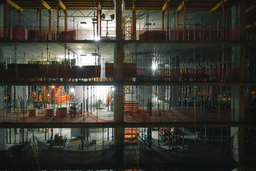 Aerial view of the high rise construction site at night