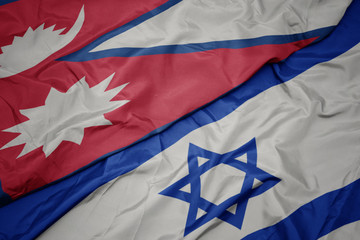 waving colorful flag of israel and national flag of nepal.