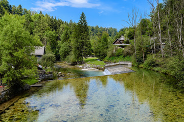 Fototapeta na wymiar Traditional old water mill on the Radovna river.
