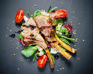 Grilled rack of lamb on slate plate
