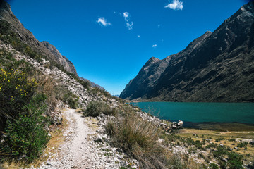 Fototapeta na wymiar Lake View on Santa Cruz Trek in Huscaran National Park in the Cordillera Blanca in Northern Peru 