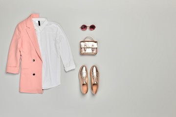 Autumn Arrives. Fashion Lady Clothes fall Outfit. Trendy jacket, trousers. Stylish gold Handbag,...