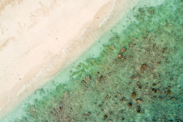 Aerial top view beautiful sea landscape, beach and wave with turquoise sea water with copy space