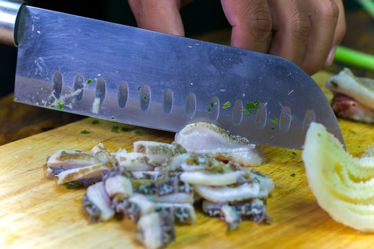 Cooking with Beef rumen on wooden broad