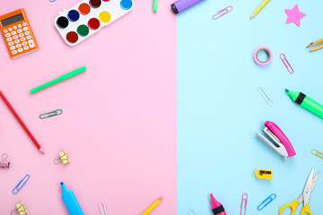 Different school supplies on colorful background