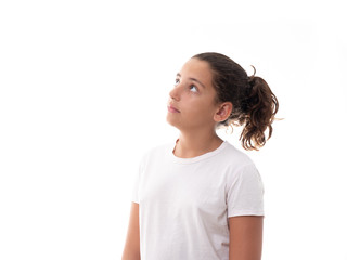 Fototapeta premium portrait of a girl isolated on white background looking up