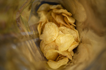 open pack of potato chips