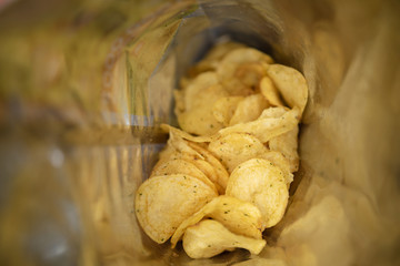 open pack of potato chips