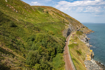 Fototapeta na wymiar Train rail in Cliff walk trail in Bray