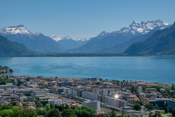 Fototapeta na wymiar View on Lausanne town, Lake Geneva and Alps Mountains, Switzerland