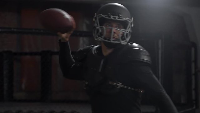 A young man trains and plays American football, throws and catches the ball