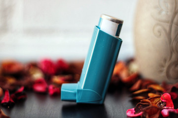 Obraz na płótnie Canvas Medicine and health concept: Blue inhaler.