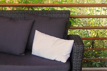 favorite seat on a lounge sofa in a green patio
