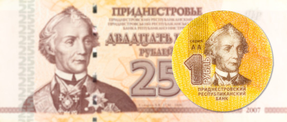 1 transnistrian ruble coin against 25 transnistrian ruble banknote indicating growing economics with copyspace