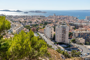 Fototapeta premium view to city and sea with mountains on background