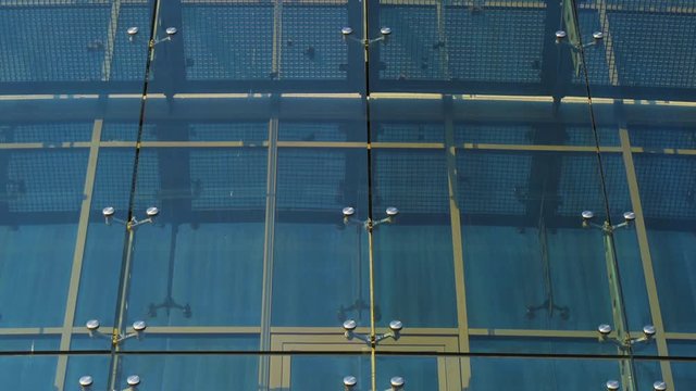 Glass Curtain Facade Wall. Fasteners Elements of Spider Glass System. Facade Detail. Architecture Abstract Background. Tilt Up