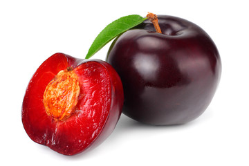 fresh plum fruit with green leaf and cut plum slices isolated on white background