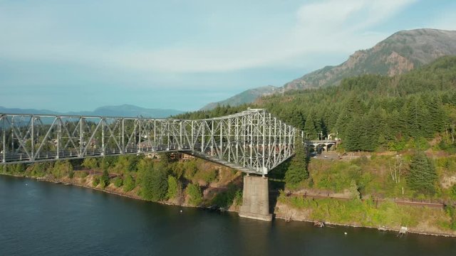 The Bridge of the Gods is a steel truss cantilever bridge that spans the Columbia River between Cascade Locks, Oregon, and Washington state near North Bonneville. 